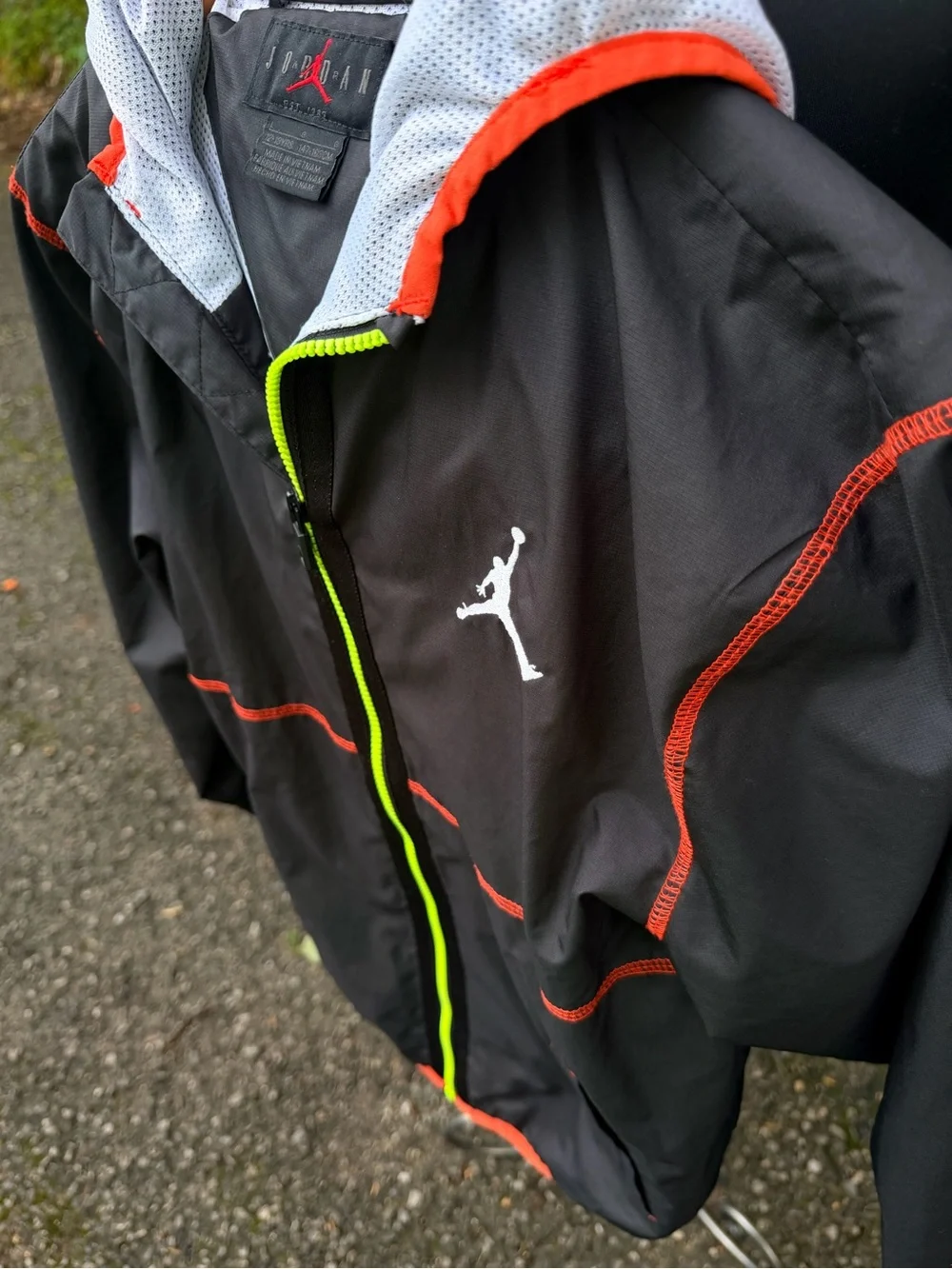 Jordan Youth Black Jacket with Neon Yellow-Green Zipper and Red Accents